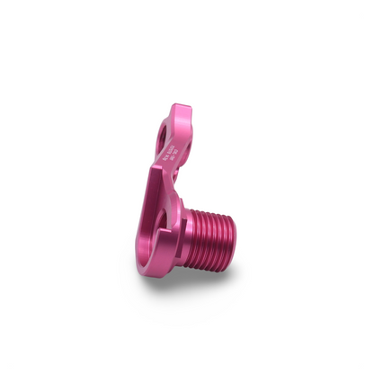 Lightweight Cervelo disc brake derailleur hanger (Pink) next to a ruler, demonstrating its sleek design and minimal weight.